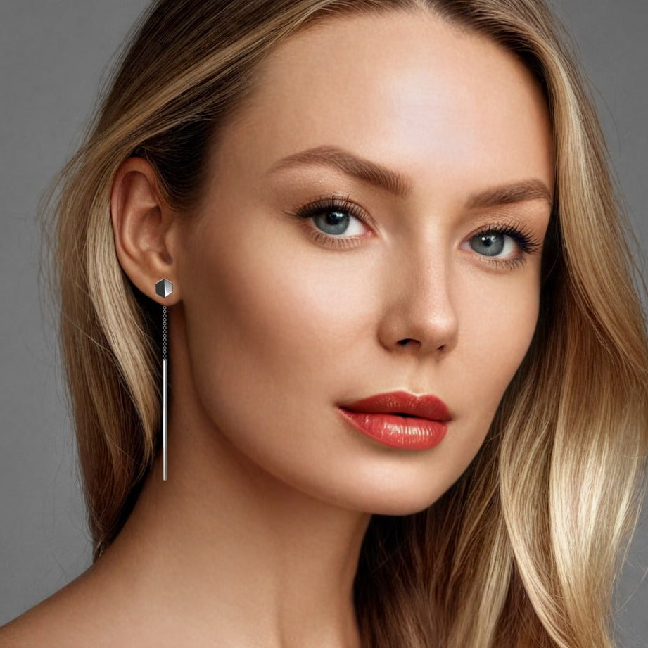 Empower You threader earrings in 18 karat surge white gold, meticulously crafted from sustainable materials. These earrings exemplify ethical luxury, handcrafted artisan jewelry, and contemporary high-end jewelry design, perfect for those who value minimalist elegance with a conscious twist.