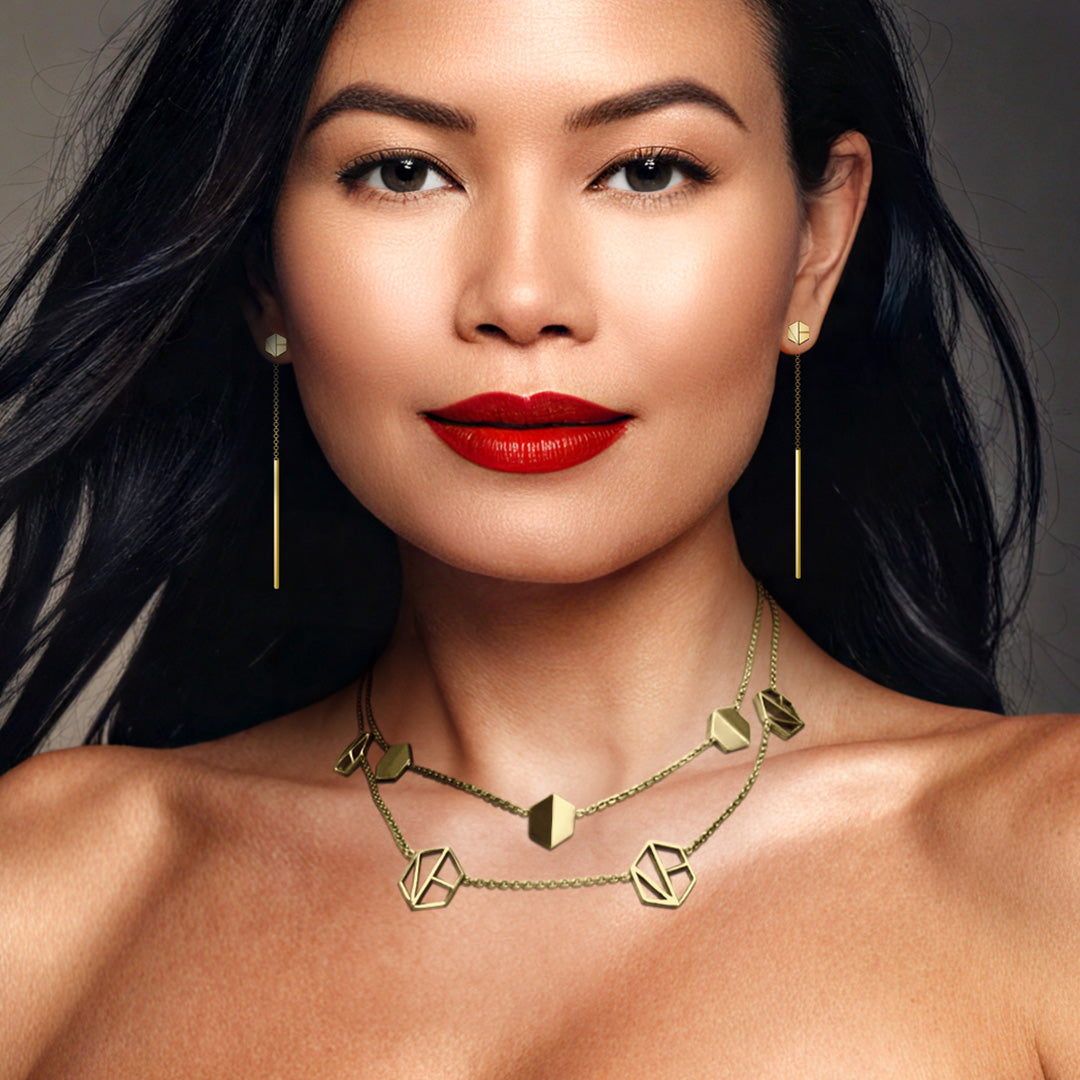 See You Threader Earrings in 18K Yellow gold take center stage with this powerful luxury jewelry piece by Naude Bourn