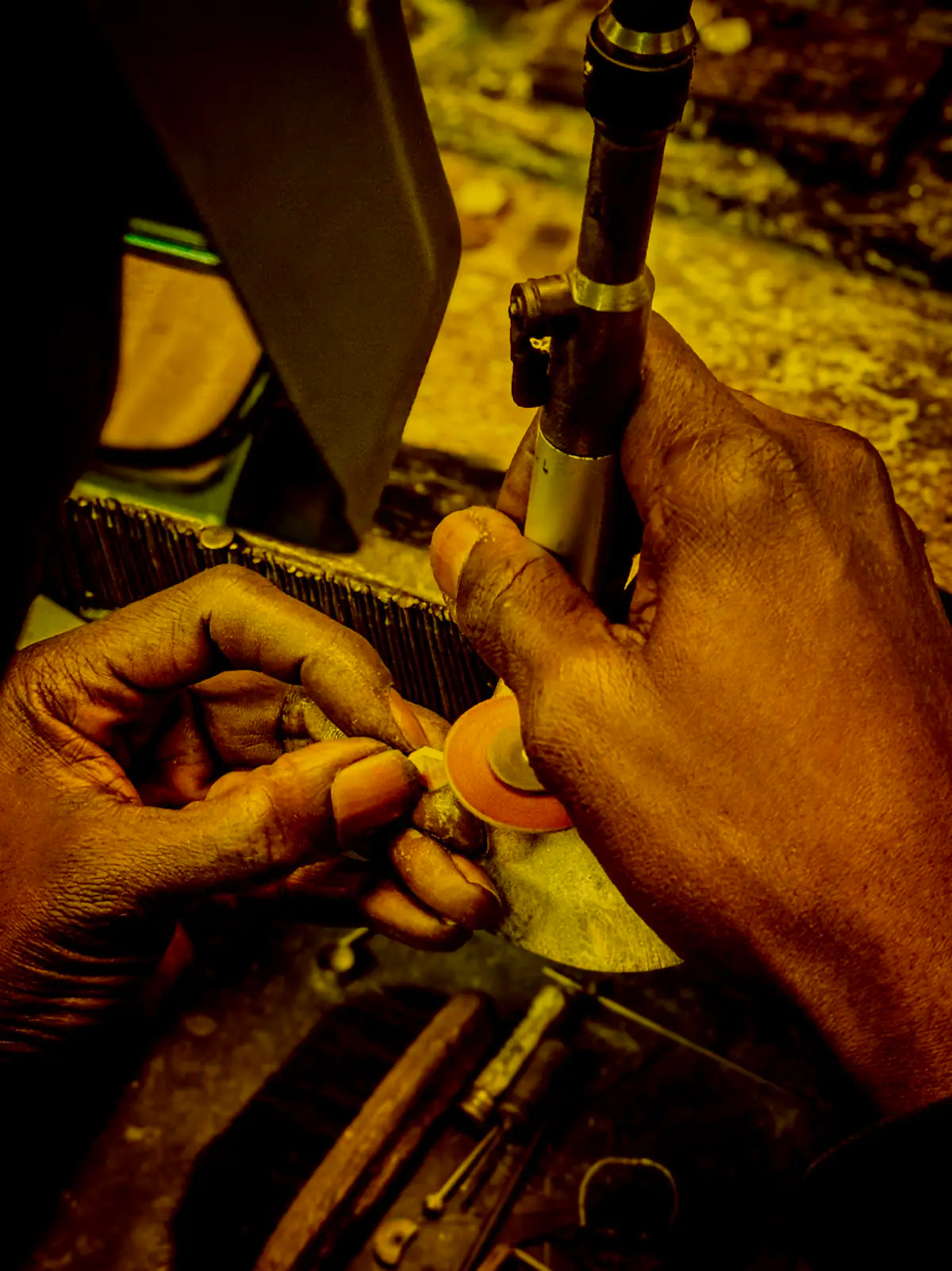 Naude Bourn's artisan jewelry production: Combining skilled artistry with ethical practices to craft luxurious, sustainable 18k gold jewelry.