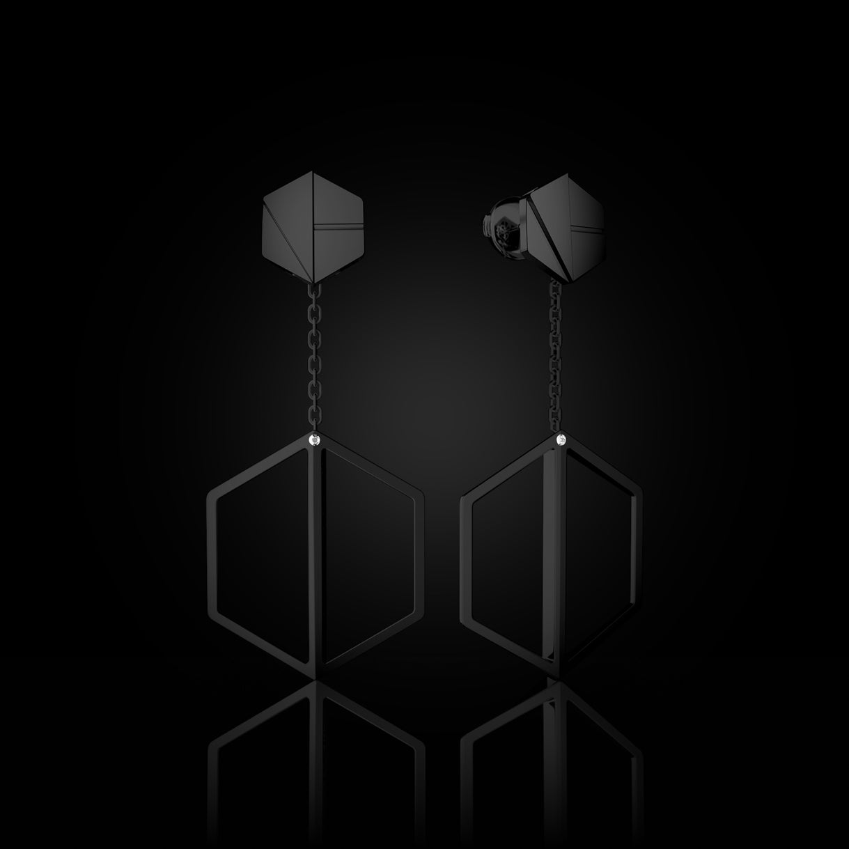 Hear You Studs with long Illuminate You Dangles in Stealth Black Gold. Sculptural 18k gold earrings—designed for stylists, fancy night out, and fashion week placements. Sustainable gold jewelry, ethical jewelry, handcrafted artisan jewelry, fine jewelry, high-end jewelry, and ethical luxury. A bold pairing from sustainable jewelry brands and a unique jewelry gift in black gold.