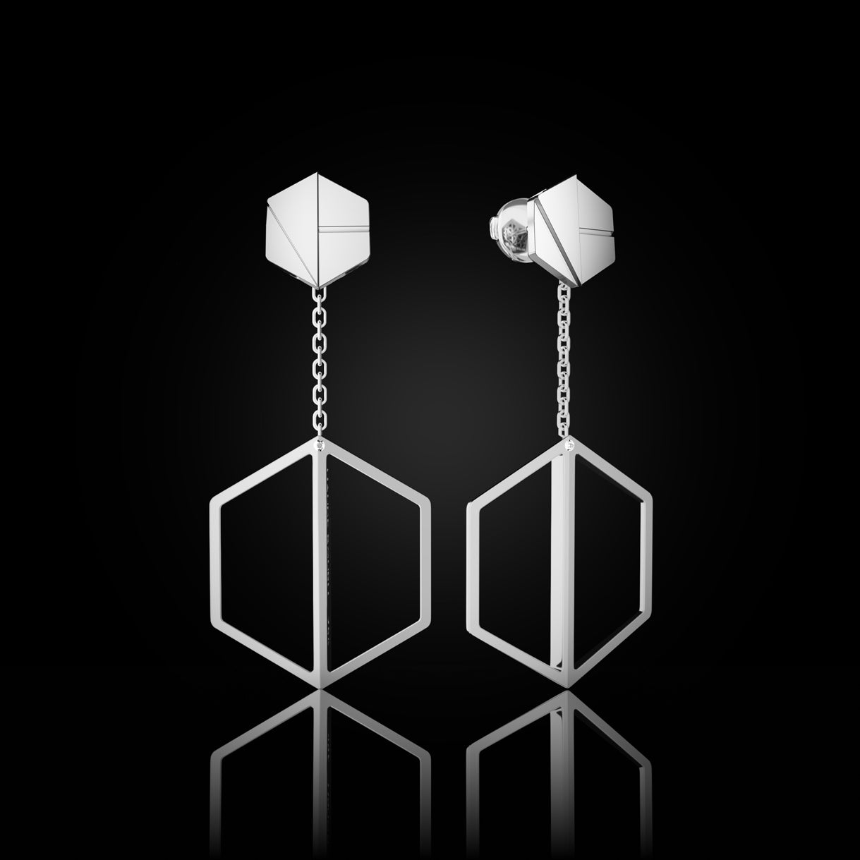 Hear You Studs with Long Illuminate You Dangles in Surge White Gold – elegant earring set designed for fluid movement and empowered presence by Naude Bourn. Sustainable gold jewelry, ethical jewelry, handcrafted artisan jewelry, fine jewelry, high-end jewelry, and ethical luxury. A sophisticated design from sustainable jewelry brands and a unique jewelry gift in white gold.