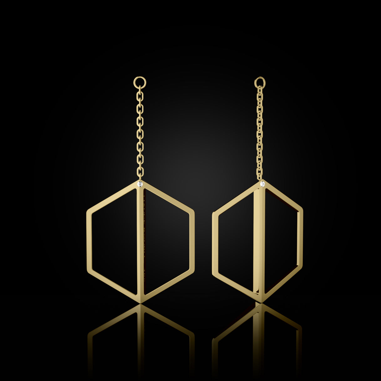 Illuminate You Dangles in Bravura Yellow Gold – long earring accessory designed to pair with studs, handcrafted with purpose by Naude Bourn. Sustainable gold jewelry, ethical jewelry, handcrafted artisan jewelry, fine jewelry, high-end jewelry, and ethical luxury. A purposeful design from sustainable jewelry brands and a unique jewelry gift in yellow gold.