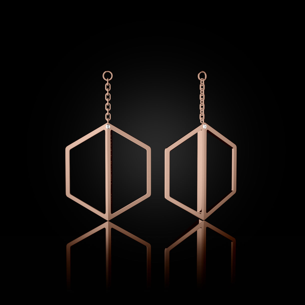 Illuminate You Dangles in Rebel Rose Gold – short earring accessory to wear with your favorite diamond studs, handcrafted by Naude Bourn. Sustainable gold jewelry, ethical jewelry, handcrafted artisan jewelry, fine jewelry, high-end jewelry, and ethical luxury. A versatile design from sustainable jewelry brands and a unique jewelry gift in rose gold.