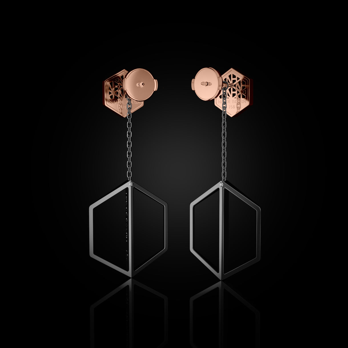Back view of Know You Studs in Rebel Rose with Long Stealth Black Dangles. 18k earrings styled for press, premieres, or stacked with diamonds. Sustainable gold jewelry, ethical jewelry, handcrafted artisan jewelry, fine jewelry, high-end jewelry, and ethical luxury. A bold pairing from sustainable jewelry brands and a unique jewelry gift in rose and black gold.