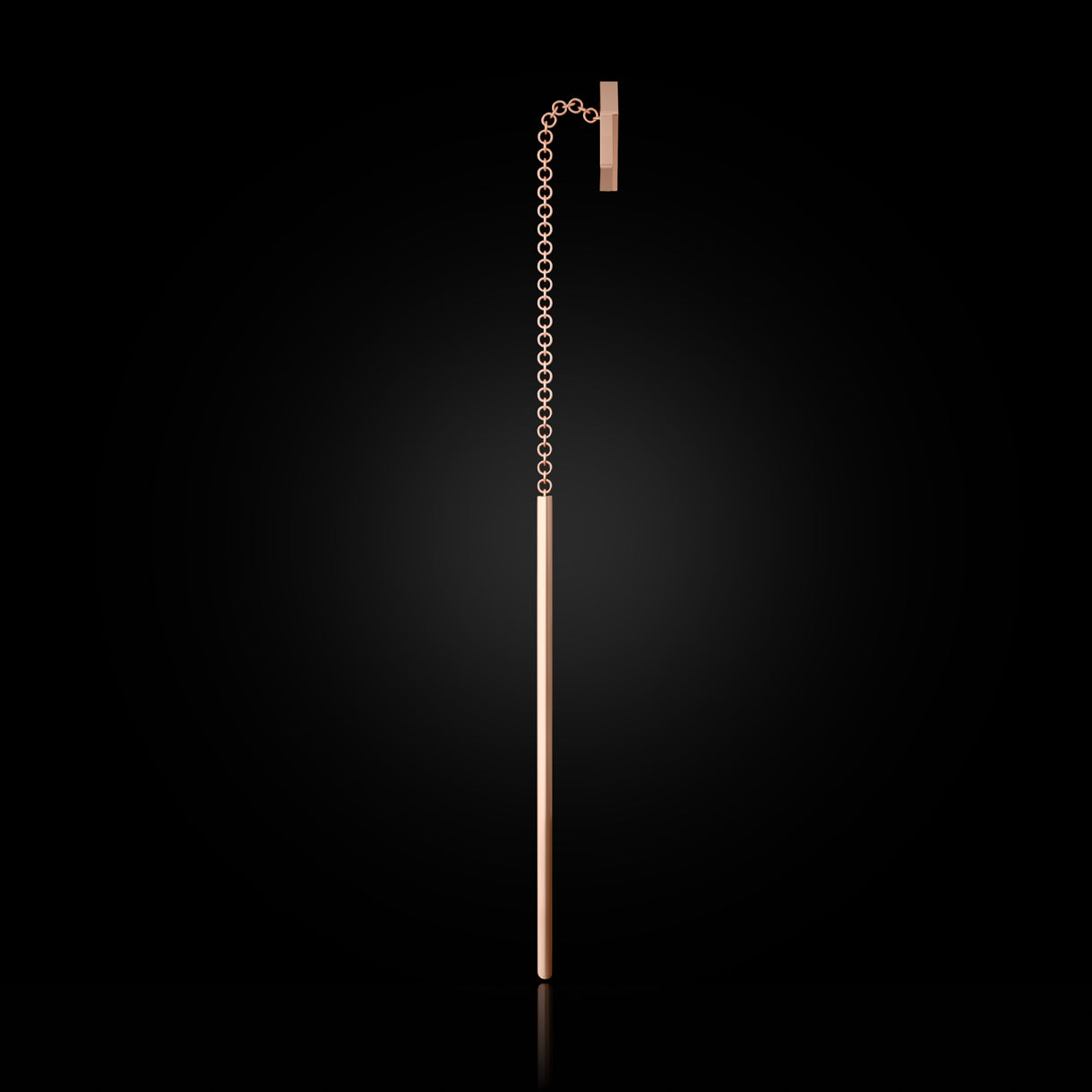 Side view of SEE YOU Threader in Rebel Rose Gold. Sleek 18k gold earring with soft edge—styled for day-to-night boldness. Sustainable gold jewelry, ethical jewelry, handcrafted artisan jewelry, fine jewelry, high-end jewelry, and ethical luxury. A versatile piece from sustainable jewelry brands and a unique jewelry gift in rose gold.