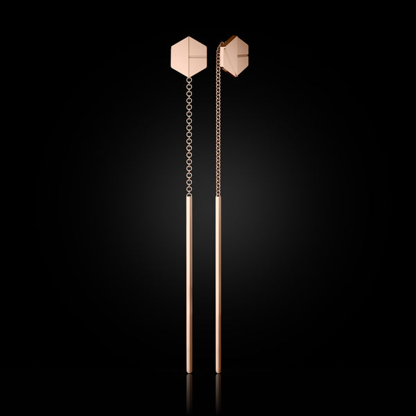 SEE YOU Threader Earrings in Rebel Rose Gold. Luxury 18k gold earrings with sleek, sculptural drop. Ethically made in NYC. Sustainable gold jewelry, ethical luxury, handcrafted artisan jewelry, and fine jewelry. A unique jewelry gift that embodies timeless elegance.